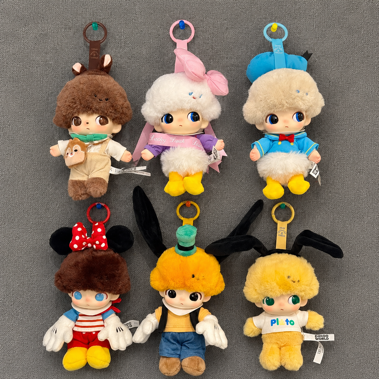 POP MART DISNEY DIMO PELUCHE VISAGE VINYLE BOÎTE MYSTÈRE - 1 ALÉATOIRE