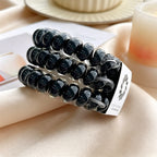 TT SEAMLESS PHONE CORD HAIR TIE 3-PACK - 20 COLOURS